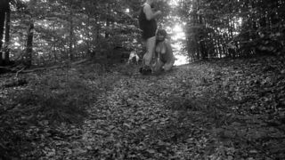 Naked submissive slut taken for a walk on a leash in forest - porn video